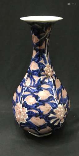 A Blue and Copper Red Vase