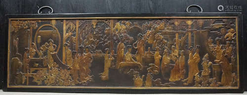 A LACQUER WARE CARVING OF TWELVE LADIES