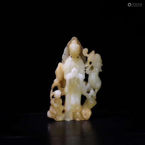 A HETIAN JADE GUANYIN FIGURE