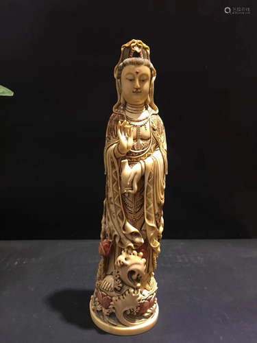 A XY CARVED GUANYIN ORNAMENT