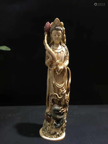 A XY CARVED GUANYIN ORNAMENT