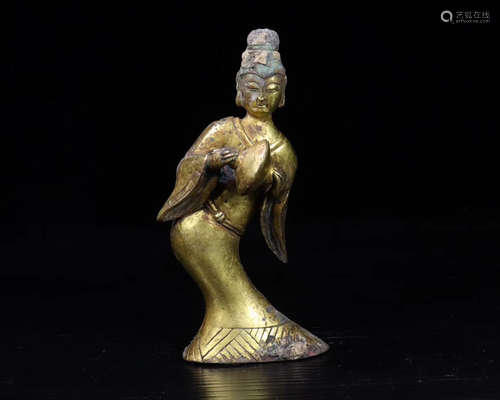 A BRONZE FEMALE SERVANT FIGURE