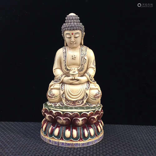 A XY COLORFUL BUDDHA FIGURE