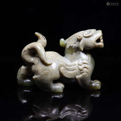 A JADE CARVED BEAST SHAPED FIGURE