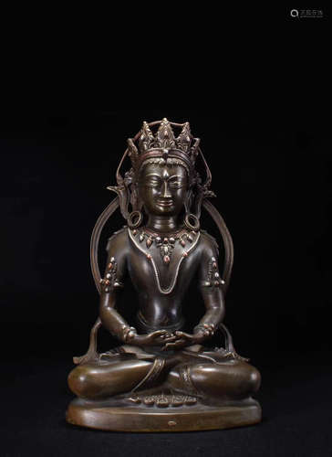 A BRONZE GLITED BUDDHA