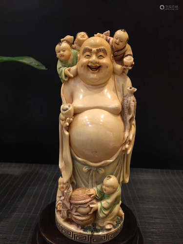 A XY HAPPY BUDDHA AND CHILDREN FIGURE