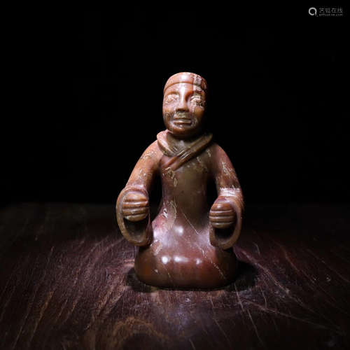 A HETIAN JADE CARVED MAN FIGURE