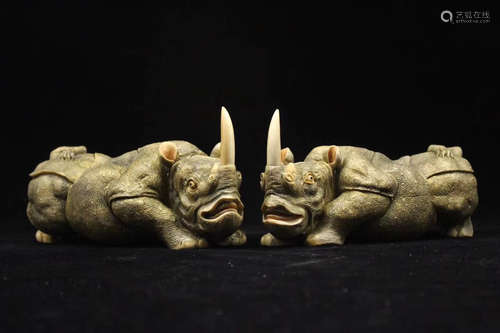 TWO XY RHINO FIGURES