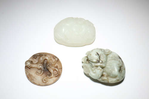 A Set of Three Carved Jade Pendant
