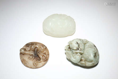 A Set of Three Carved Jade Pendant