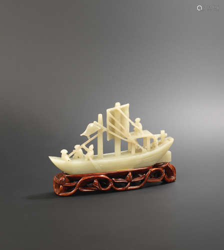 19th century A pale green jade sail boat with figures