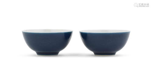 Yongzheng six-character marks and of the period A rare pair of blue-glazed cups