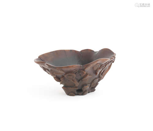 17th/18th century A rhinoceros horn 'flowers and lotus' libation cup