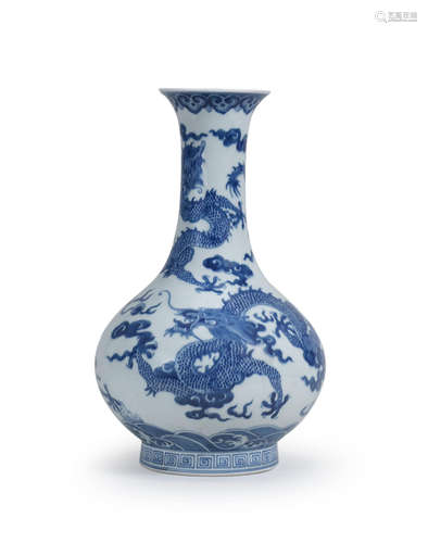 Jiaqing seal mark and of the period A blue and white 'dragon' bottle vase