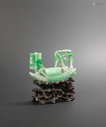 Late Qing Dynasty A jadeite carving of a sampan with figures