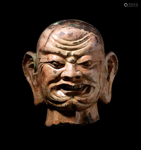 Liao/ Ming Dynasty A very large polychrome-glazed pottery head of a Luohan