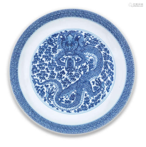 Kangxi six-character mark and of the period A rare blue and white 'dragon' dish