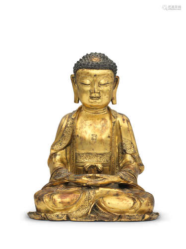 Late Ming Dynasty A gilt-bronze figure of the Medicine Buddha