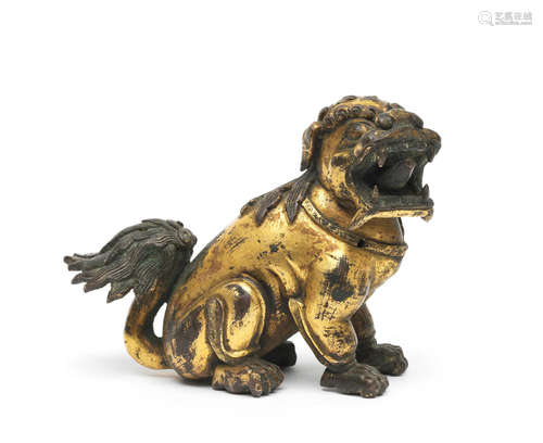 17th century A gilt-bronze figure of a Buddhist lion