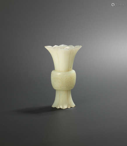 18th century A white jade archaistic vase, gu