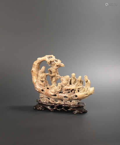 Late Qing Dynasty A soapstone carving of the Eight Immortals on a raft