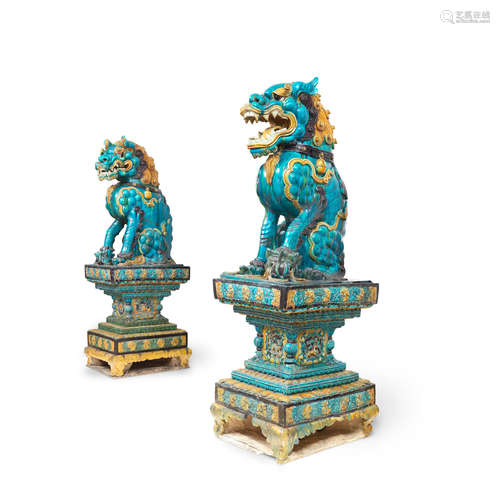 Late Ming Dynasty, 16th/17th century A very rare pair of monumental fahua Buddhist lions on stands