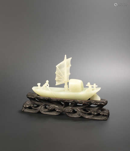 19th century A fine white jade carving of a sampan with two figures