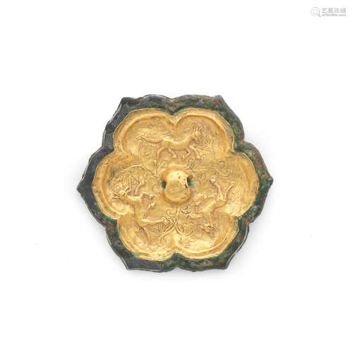 Tang Dynasty A rare gold-sheet-inlaid bronze foliate mirror