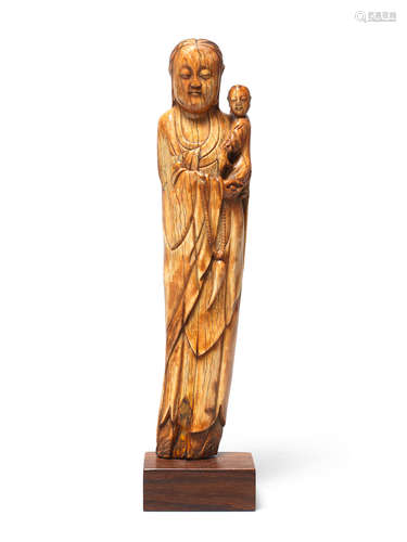 Late Ming Dynasty An ivory carving of Guanyin and boy