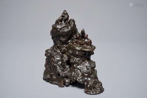 A CHINESE BRONZE INCENSE BURNER MODELLED AS A MOUNTAIN WITH QI-PLAYERS, 18/19TH C.