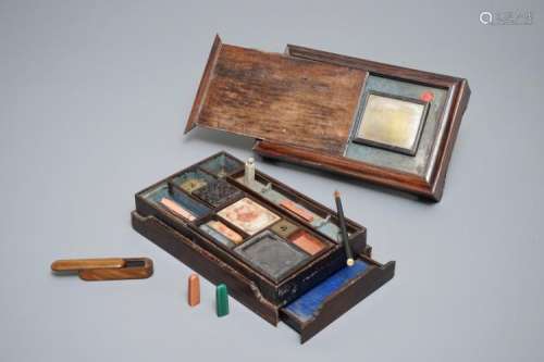 A CHINESE CALLIGRAPHY OR ARTIST'S SET IN WOODEN BOX CONTAINING VARIOUS SEALS, AN INK STONE AND MORE, 19/20TH C.