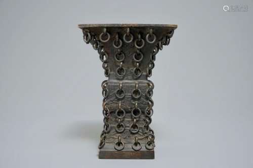 A CHINESE ARCHAISTIC RINGED BRONZE FANGGU VASE, MING
