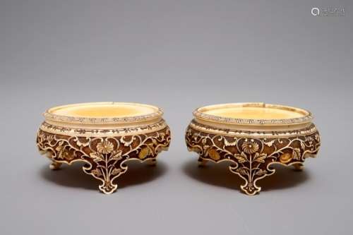 A PAIR OF JAPANESE CARVED IVORY STANDS, MEIJI, 19TH C.