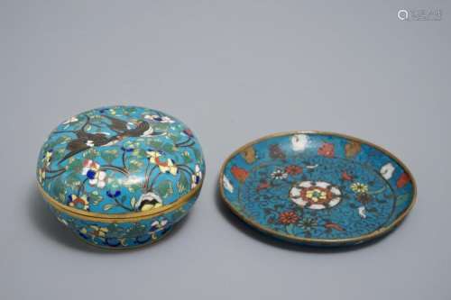 A CHINESE CLOISONNÉ SAUCER WITH FLORAL DESIGN, MING, AND A ROUND BOX AND COVER, 19TH C.