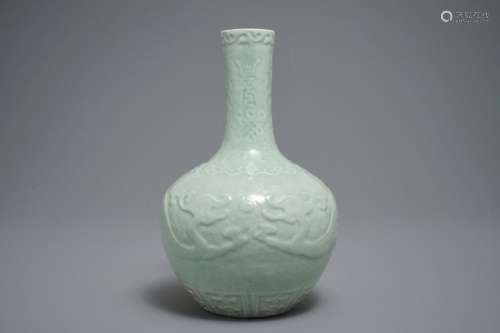 A CHINESE BOTTLE-SHAPED CELADON VASE WITH APPLIED DESIGN, QIANLONG MARK, 19/20TH C.