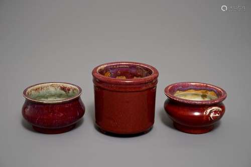 TWO CHINESE OXBLOOD-GLAZED INCENSE BURNERS AND A BRUSH POT, 19/20TH C.