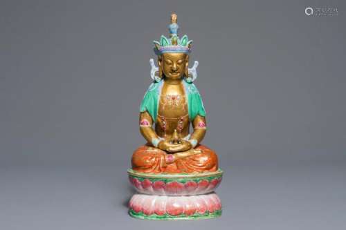 A CHINESE PARCEL-GILT FAMILLE ROSE MODEL OF BUDDHA, 19TH C.
