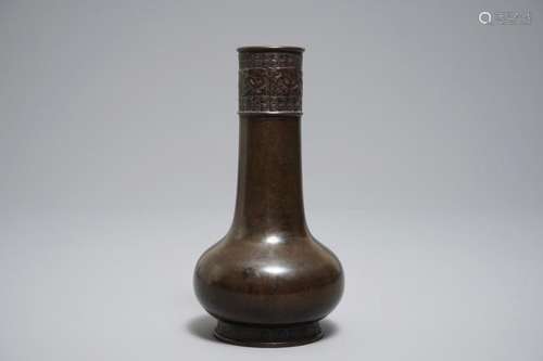 A CHINESE BOTTLE-SHAPED BRONZE VASE WITH APPLIED DESIGN, YUAN