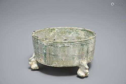 A CHINESE GREEN-GLAZED POTTERY TRIPOD CENSER, HAN