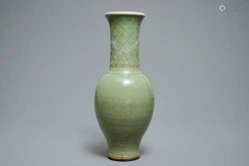 A TALL CHINESE LONGQUAN CELADON VASE WITH UNDERGLAZE DESIGN, SONG OR MING