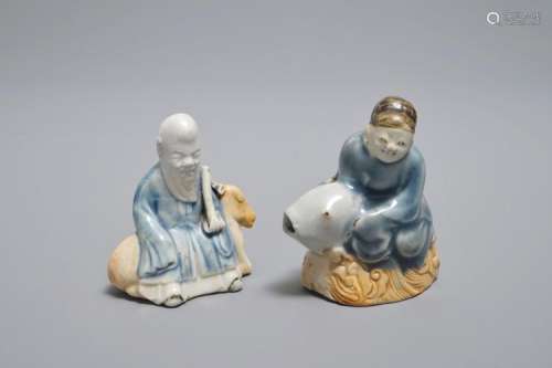 TWO CHINESE FIGURATIVE BLUE AND WHITE ON BISCUIT WATER DROPPERS, QIANLONG