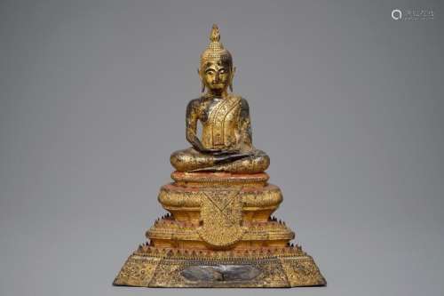 A THAI GILT BRONZE MODEL OF BUDDHA ON A THRONE, RATTANAKOSIN, 19TH C.