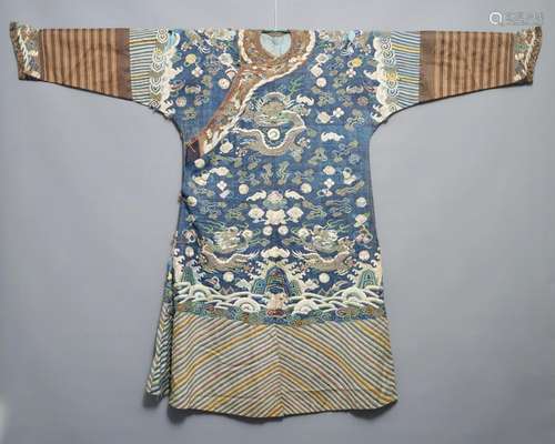 A CHINESE BLUE-GROUND KESI EIGHT-DRAGON ROBE, 19TH C.