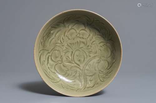 A CHINESE CARVED YAOZHOU DISH, PROBABLY SONG