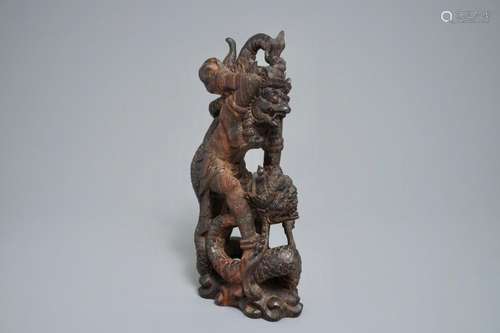 AN INDONESIAN CALAMANDAR WOODEN SCULPTURE OF VISHNU RIDING NAGA, 19TH C.