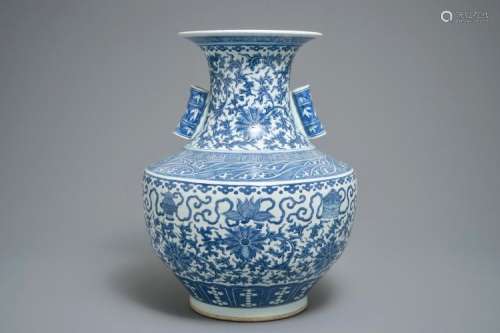 A CHINESE BLUE AND WHITE LOTUS SCROLL HU VASE, 19TH C.