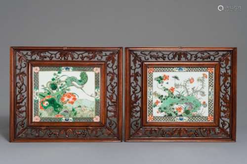 TWO CHINESE FAMILLE VERTE PLAQUES IN OPENWORKED WOODEN FRAMES, 19/20TH C.
