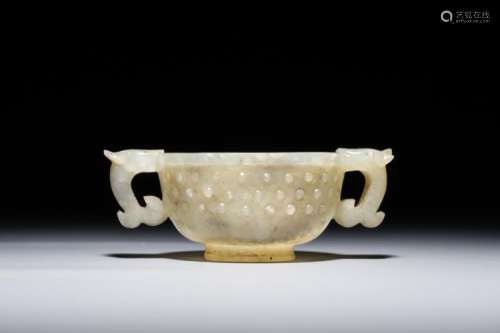 A CHINESE MOTTLED JADE TWO-HANDLED CUP, QING