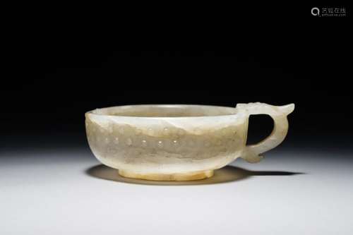 A CHINESE ARCHAISTIC GRAYISH-GREEN JADE DRAGON-HANDLED CUP, 17/18TH C.