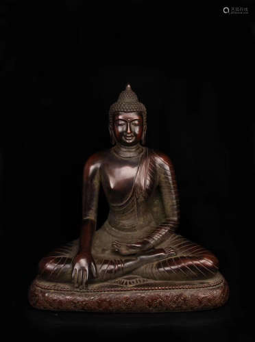 A YUAN AND MING DYNASTY PURPLE BRONZE BUDDHA STATUE